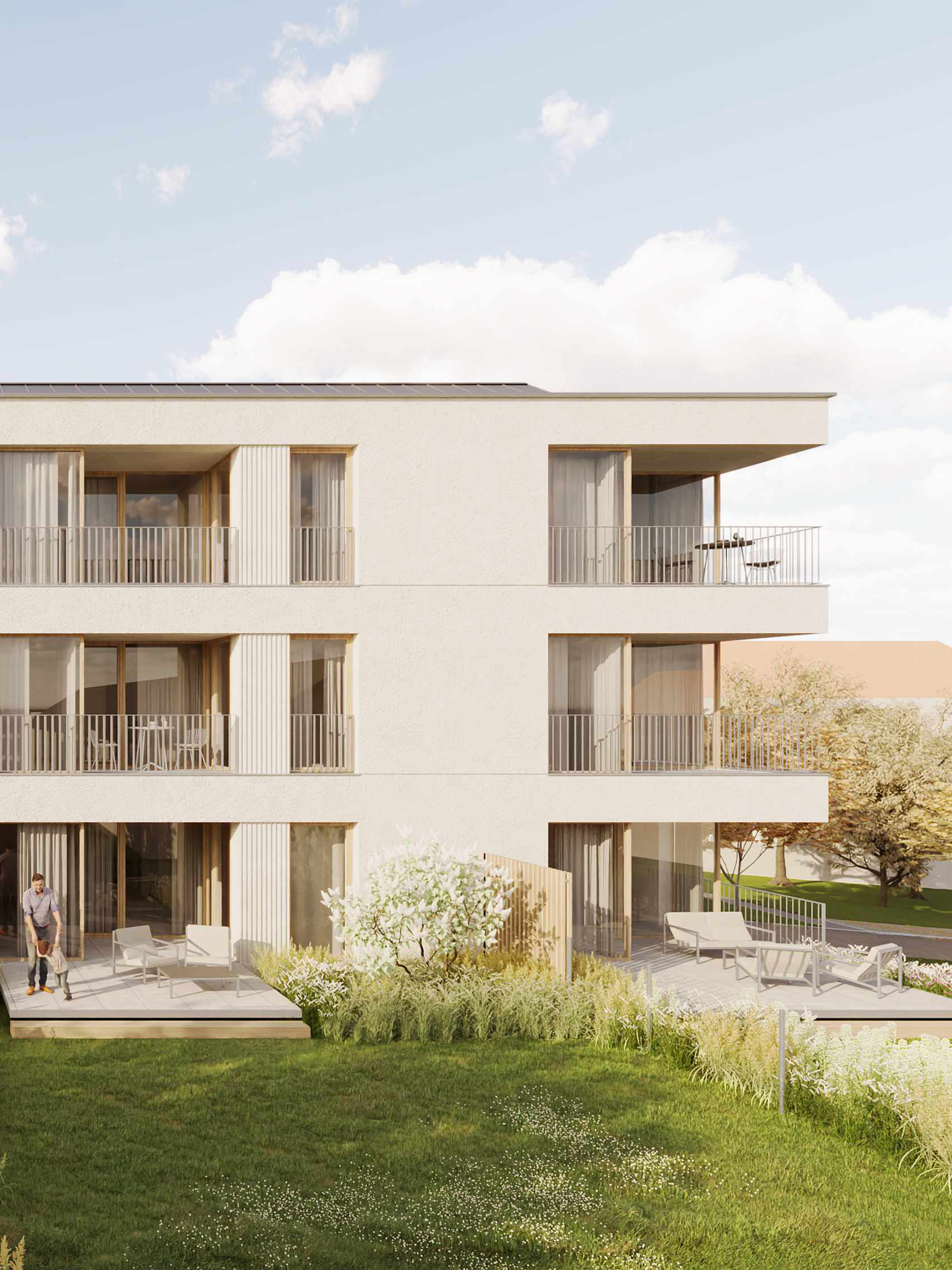 Three-story modern apartment building with large balconies and glass doors, beige facade, set in a landscaped yard.